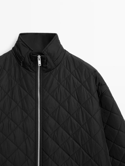 Long water-repellent oversize quilted parka