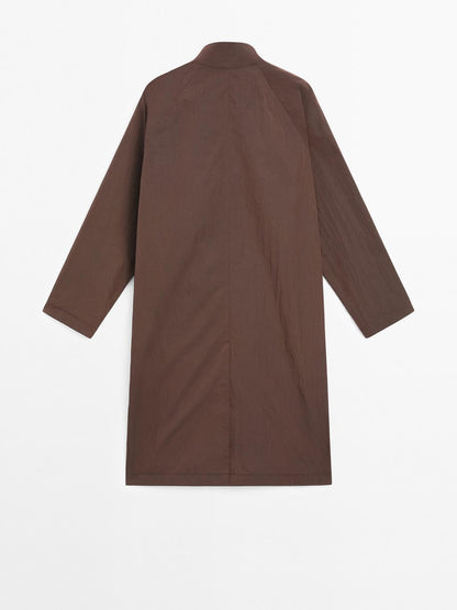 Oversize flowing trench coat in water-repellent fabric