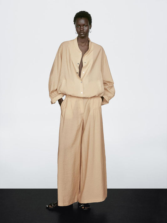 Loose-fitting bomber jacket with drawstring detail