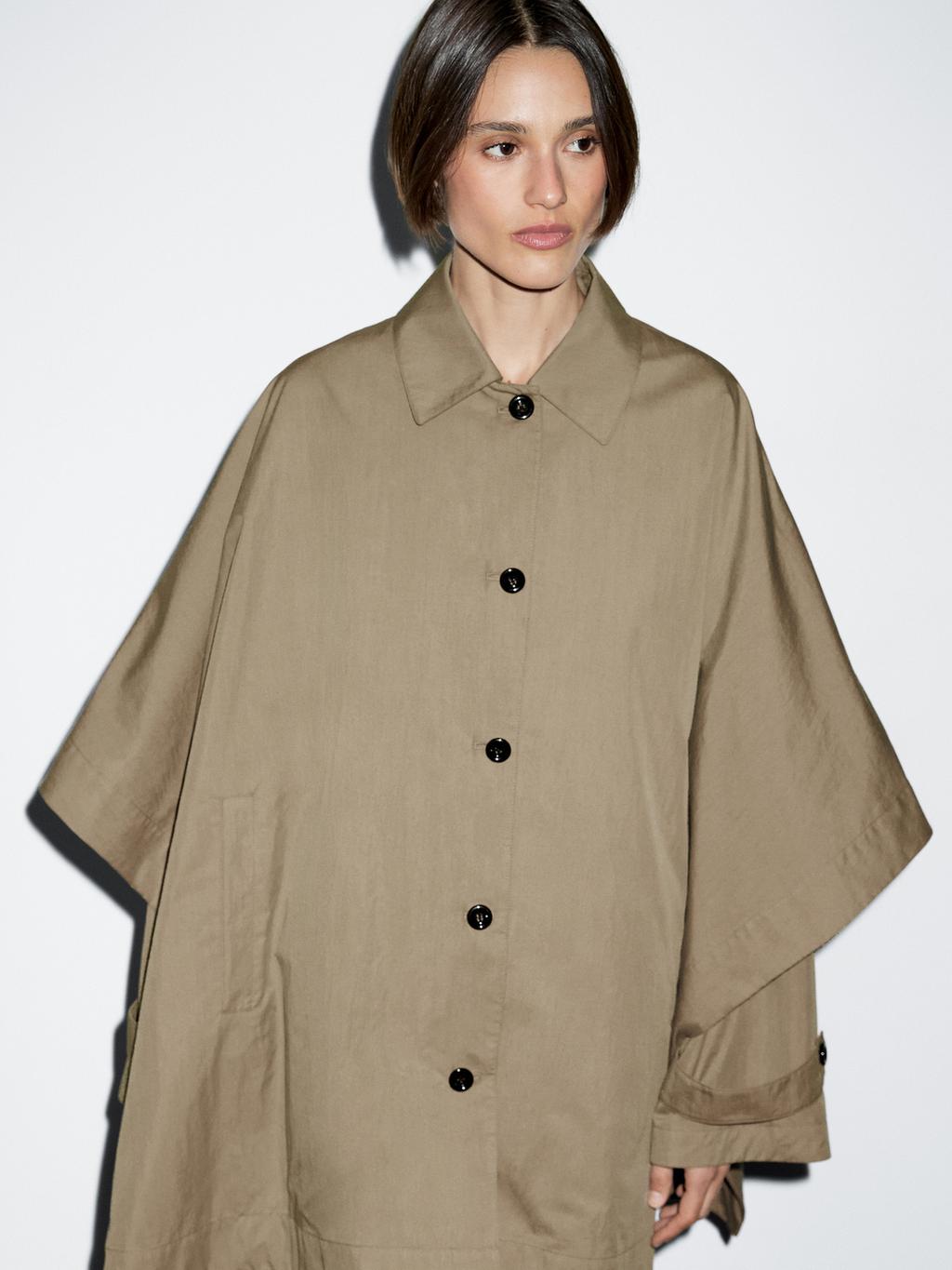 Cape trench coat with long sleeves