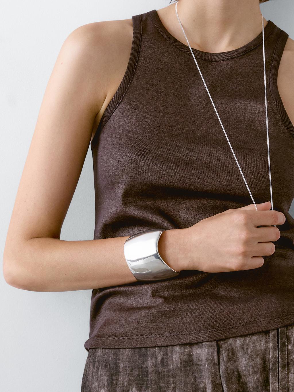 Round neck top with shimmery detail