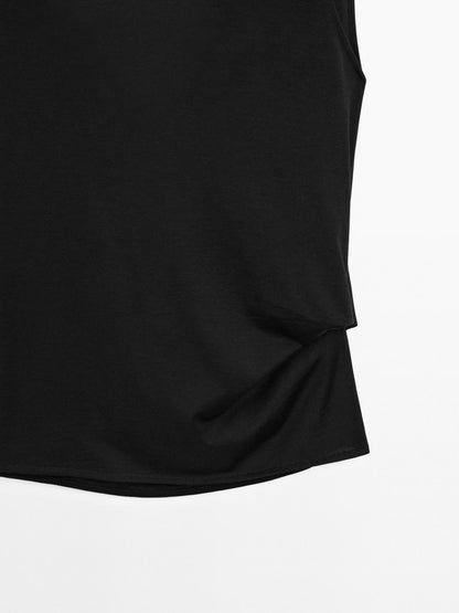 100% cotton top with draped low-cut back