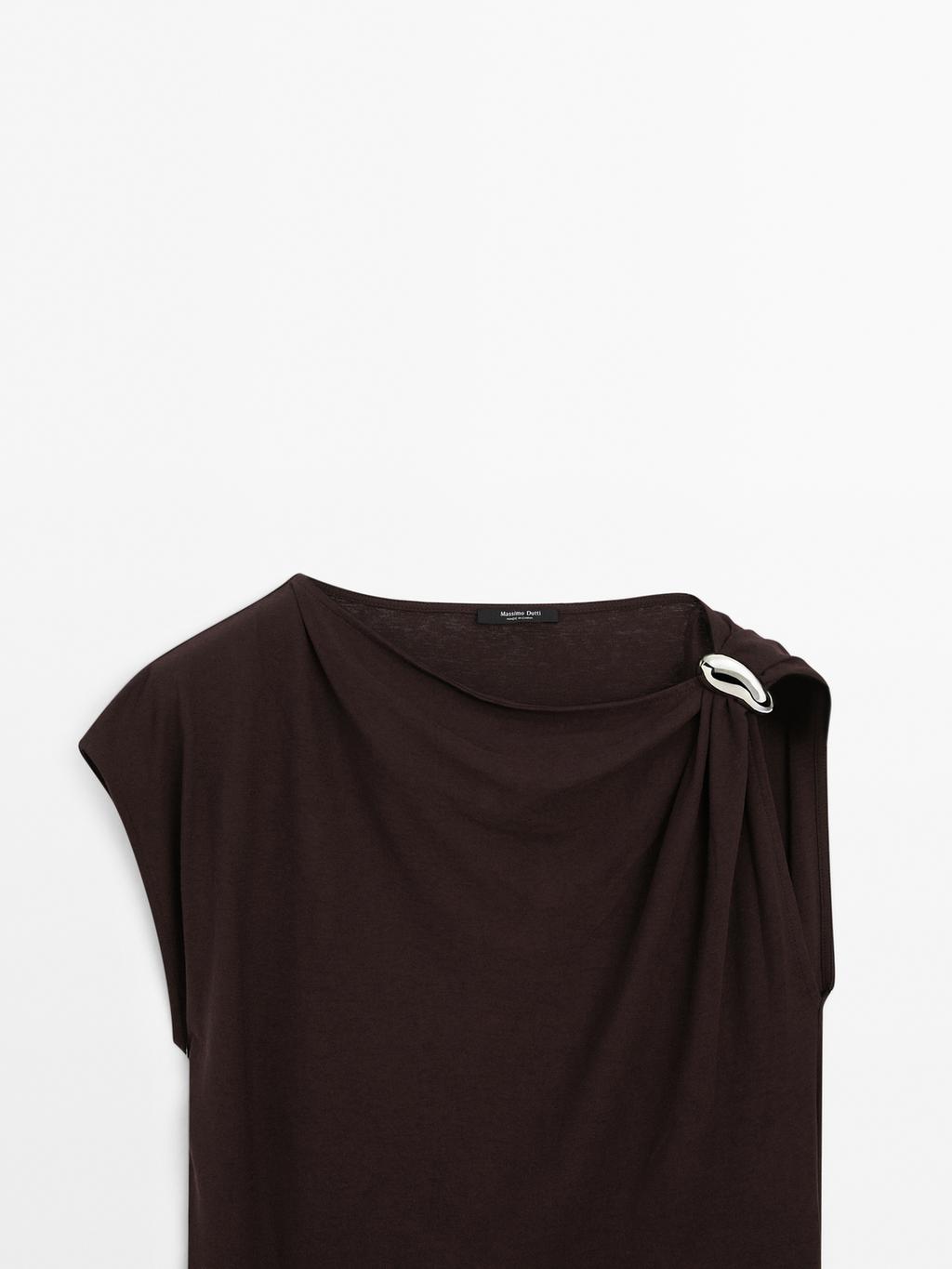 Draped neckline top with brooch detail