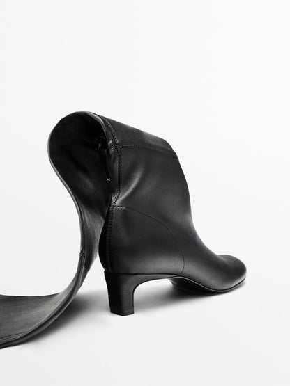 Stretch high-heel boots