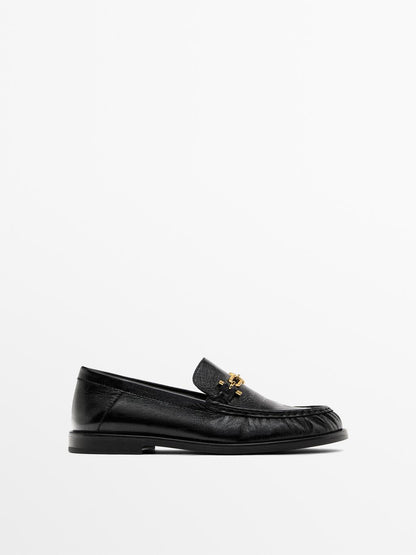 Crackled leather loafers with decorative detail