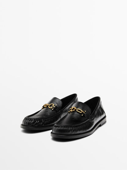 Crackled leather loafers with decorative detail