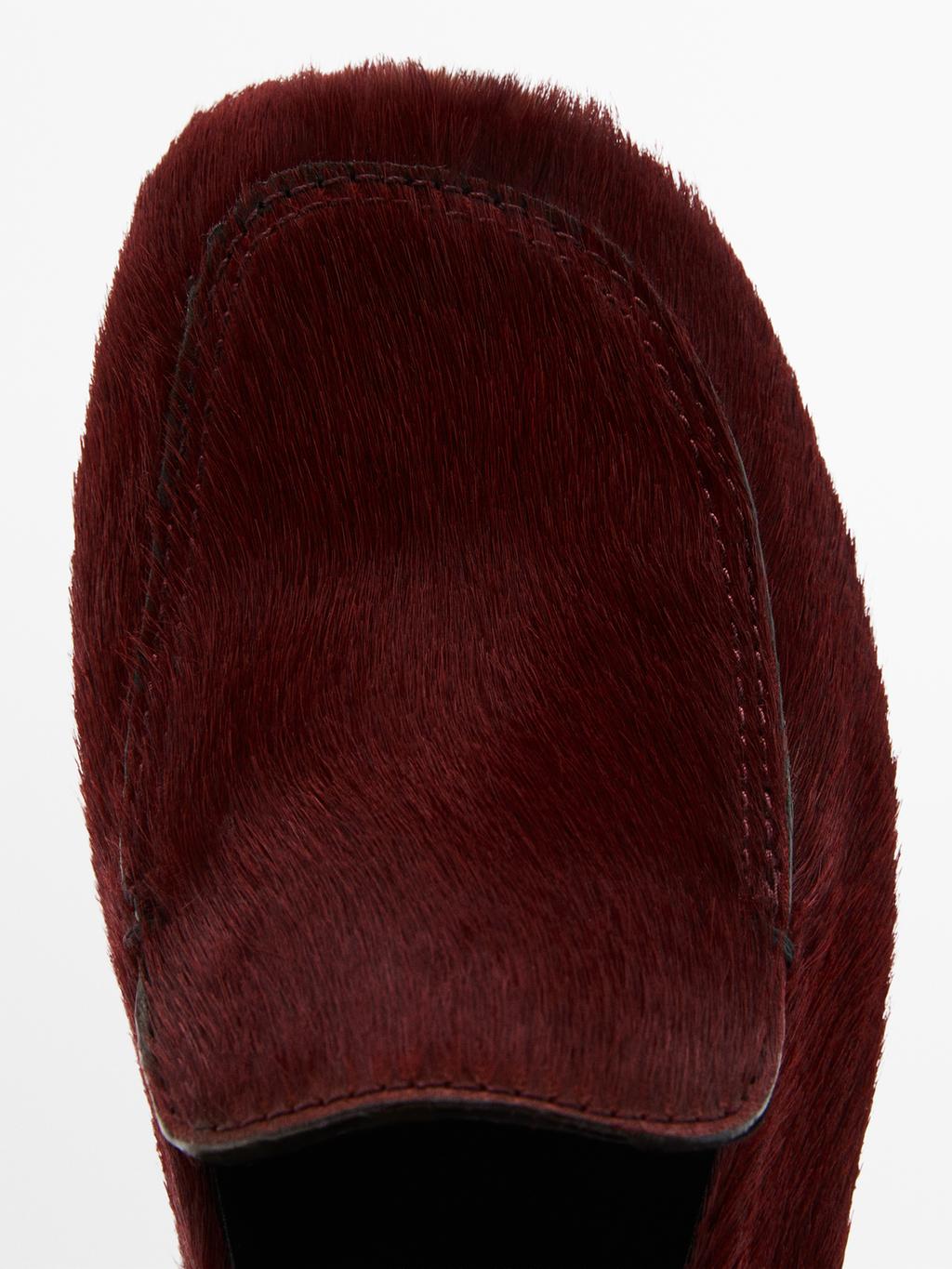 Hair on leather loafers