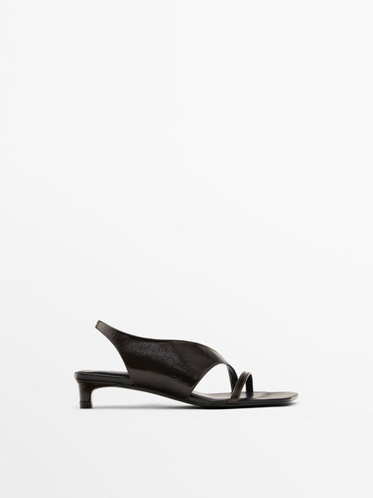 Asymmetric heeled sandals
