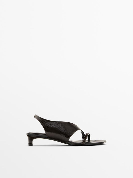 Asymmetric heeled sandals
