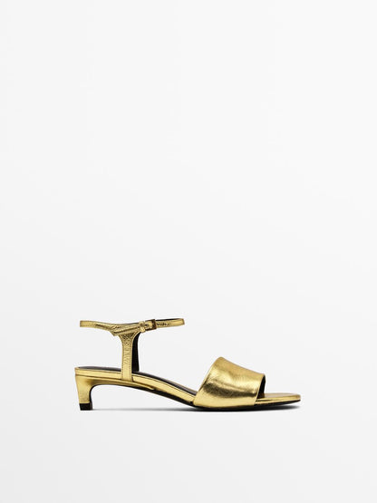 Golden slide sandals