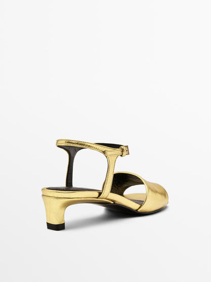 Golden slide sandals