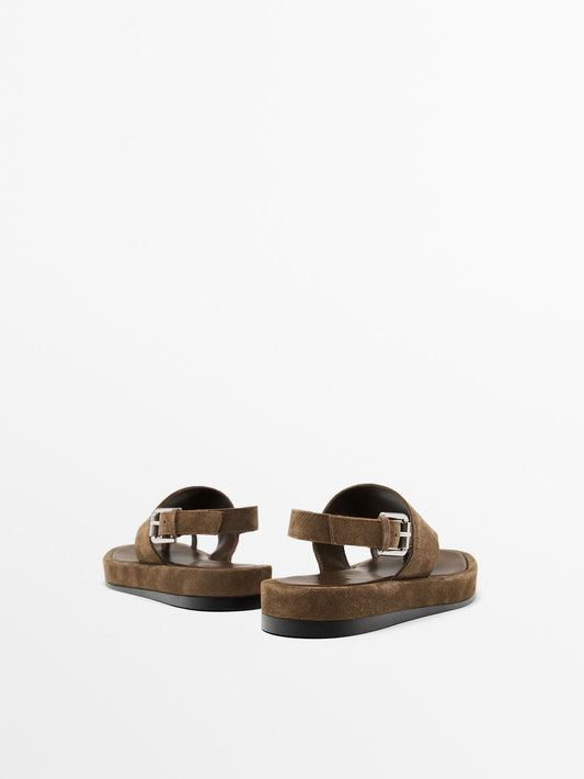 Sandals with quilted insoles